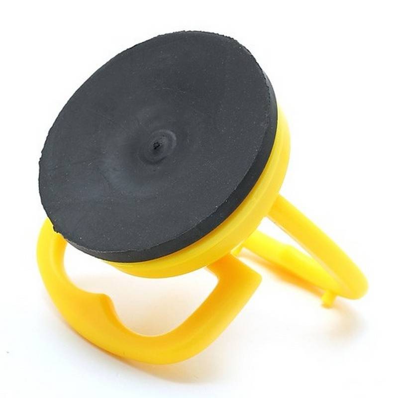 Herramienta para el extractor del vidrio en color amarillo. Tamaño 5,8 x 6,5cm